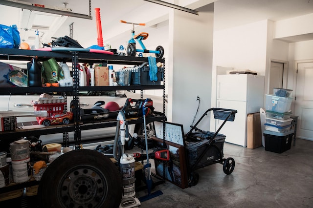 garage with white fridge