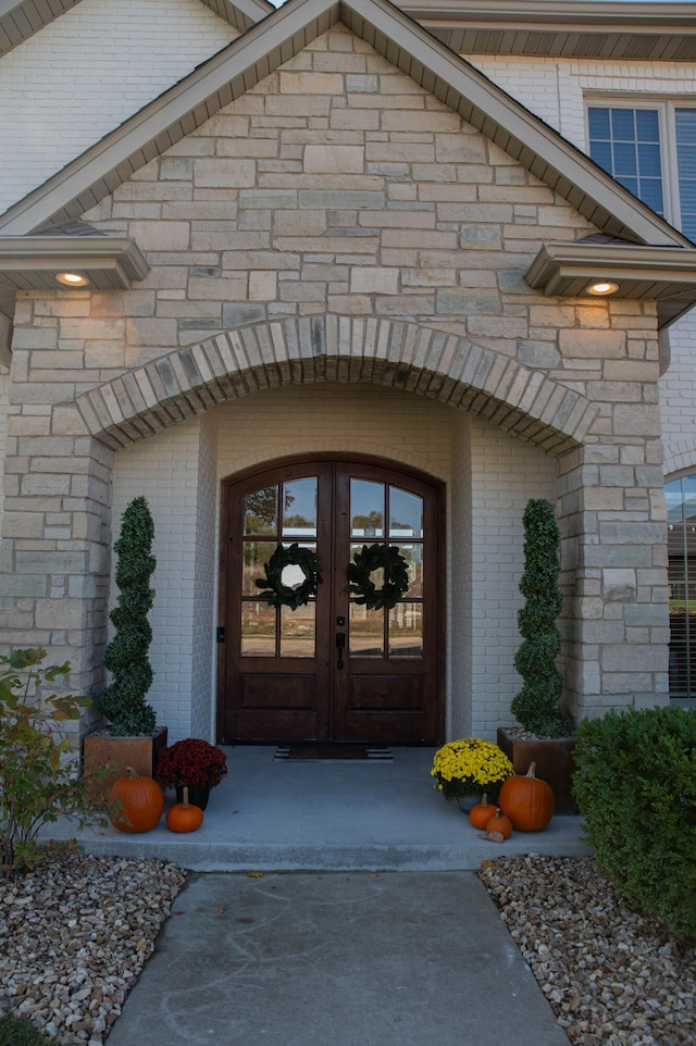 entrance to property featuring french doors