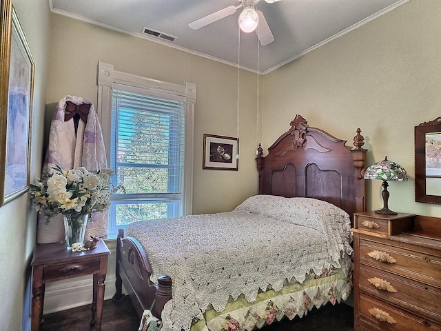 bedroom with crown molding and ceiling fan