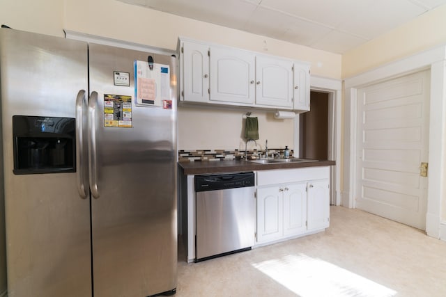 kitchen featuring white cabinetry, appliances with stainless steel finishes, and sink