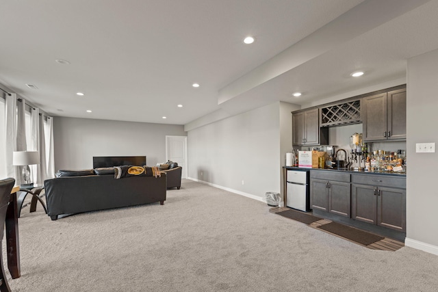 living room with indoor wet bar and carpet