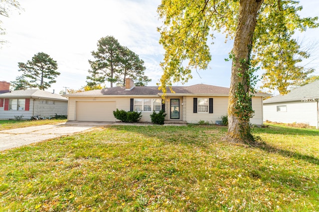 ranch-style home with a garage and a front lawn