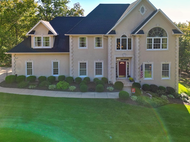 view of front of property with a front lawn