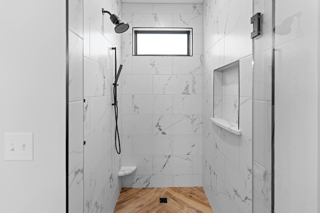 full bath featuring a shower stall