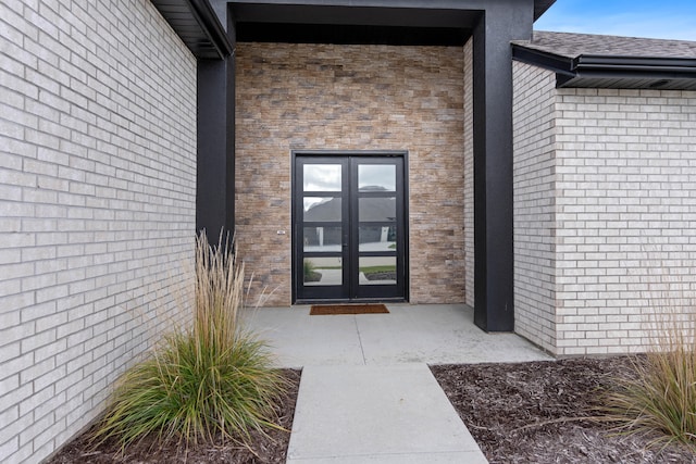 property entrance featuring french doors