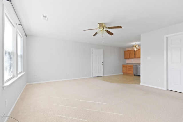 unfurnished living room with visible vents, light colored carpet, baseboards, and a ceiling fan