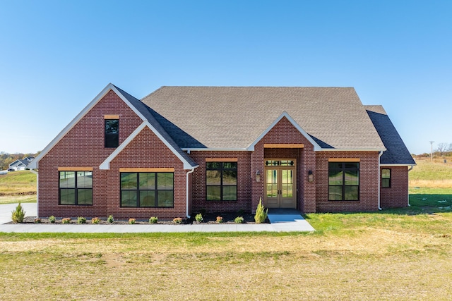 view of front of home featuring a front yard