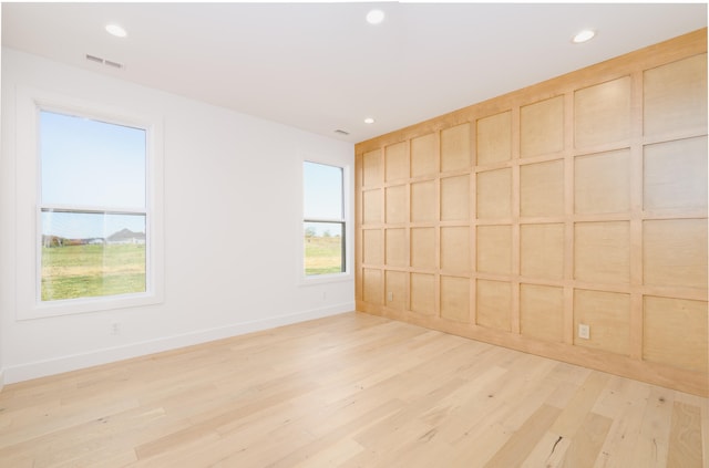 empty room with light wood-type flooring