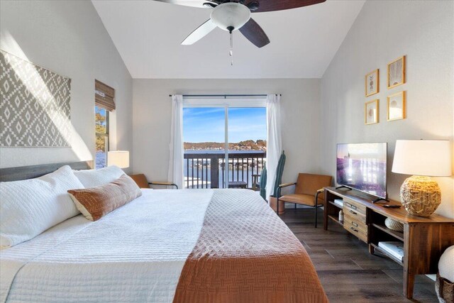 bedroom with access to exterior, dark hardwood / wood-style flooring, lofted ceiling, and multiple windows