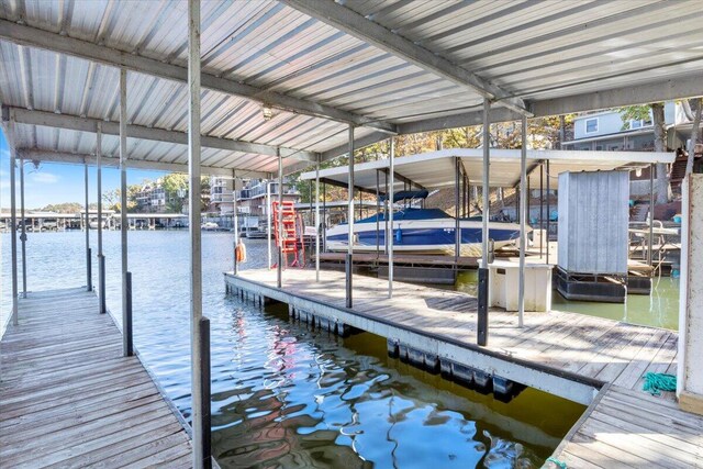 view of dock with a water view