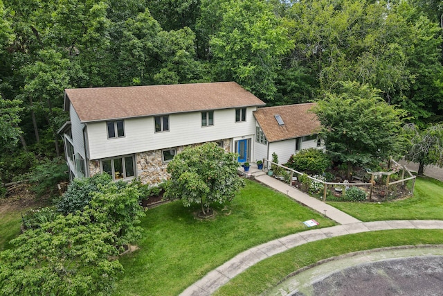 view of front of property with a front lawn