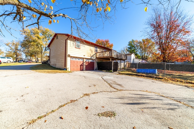 view of home's exterior with a garage