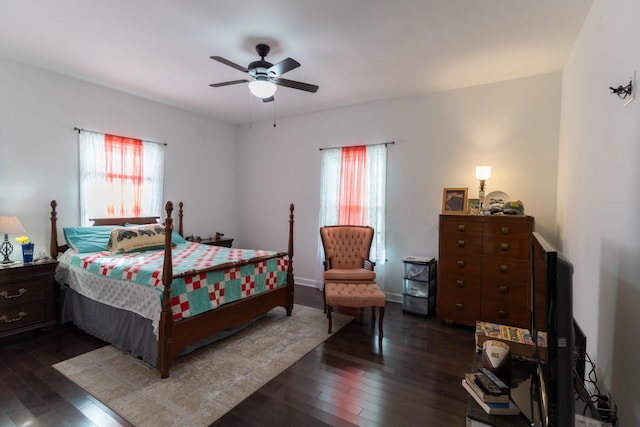 bedroom featuring ceiling fan and dark hardwood / wood-style flooring