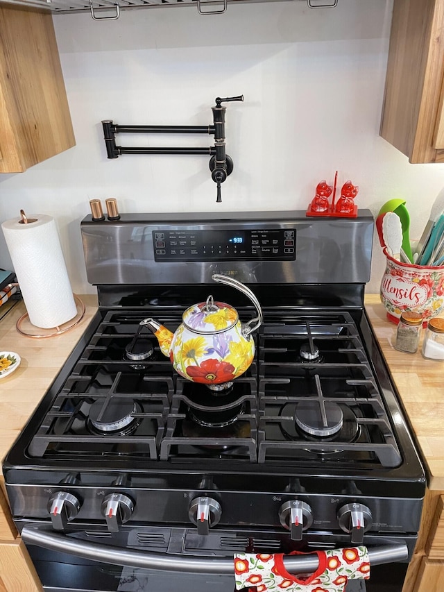 room details featuring stainless steel gas stove