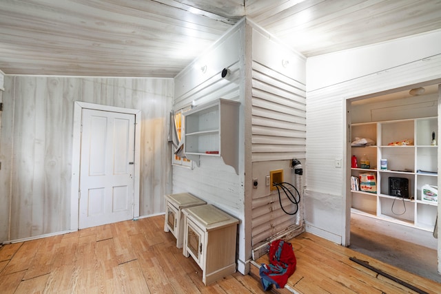 miscellaneous room featuring wooden ceiling, light hardwood / wood-style floors, and vaulted ceiling