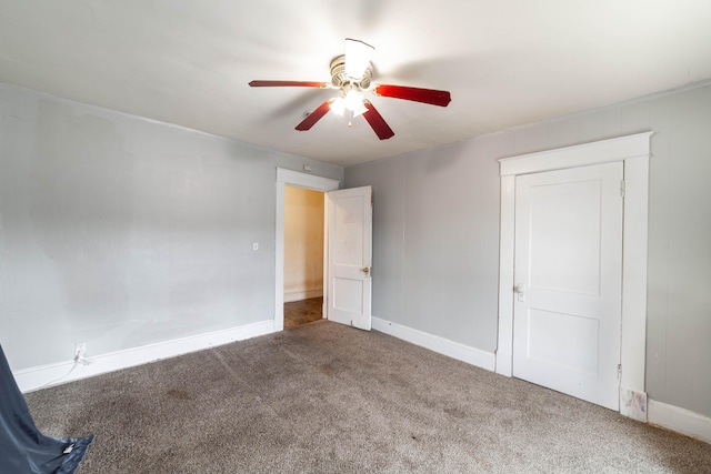 unfurnished bedroom featuring carpet floors and ceiling fan