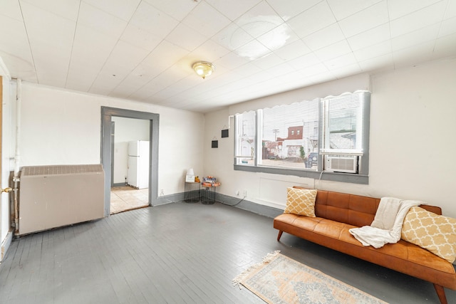 living area featuring hardwood / wood-style floors