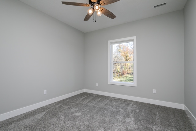 empty room with carpet and ceiling fan