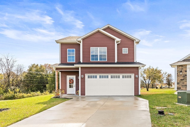 view of front of home featuring a garage and a front yard