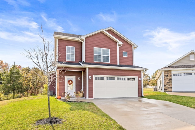 view of front of property featuring a garage and a front yard