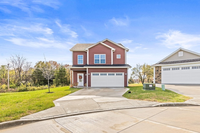 view of front of house featuring a garage and a front lawn