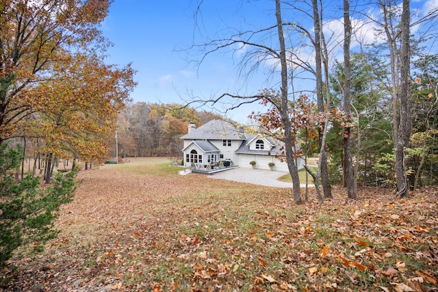 view of yard featuring a garage