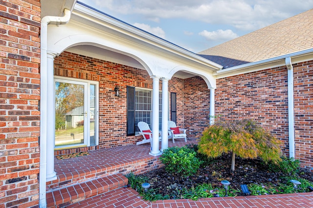 property entrance with covered porch