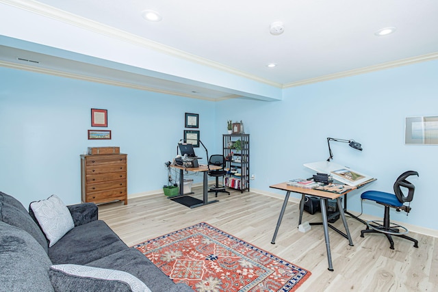 office area featuring crown molding and light hardwood / wood-style flooring