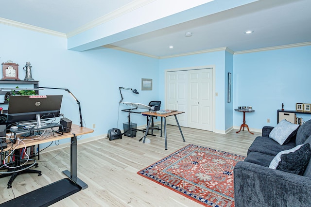 home office featuring wood-type flooring and crown molding