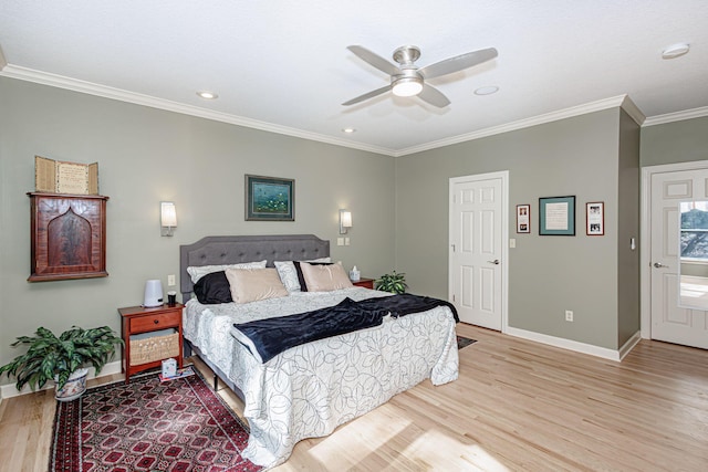 bedroom featuring ceiling fan, light hardwood / wood-style floors, and ornamental molding