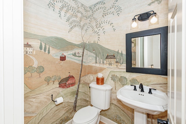 bathroom featuring sink and toilet