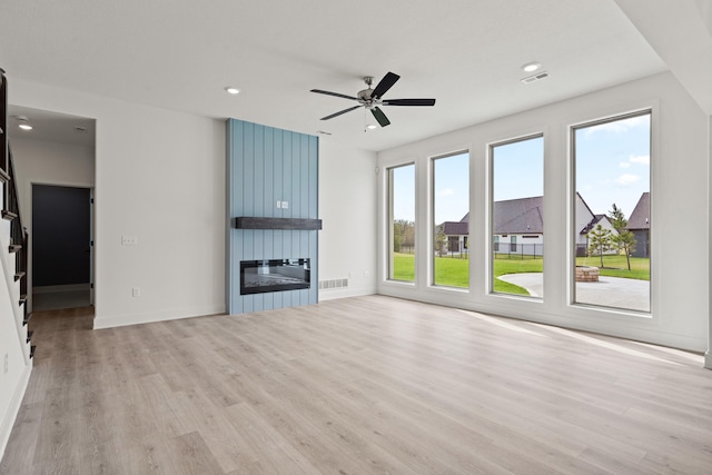6504 Walsby Dr, Columbia, MO 65201 - unfurnished living room featuring recessed lighting, visible vents, and light wood-type flooring