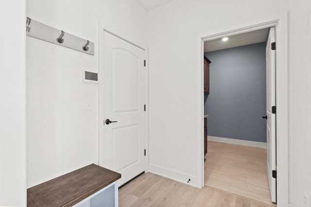 6504 Walsby Dr, Columbia, MO 65201 - mudroom featuring baseboards and light wood-style floors