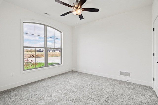 6504 Walsby Dr, Columbia, MO 65201 - carpeted empty room with baseboards, a ceiling fan, and visible vents