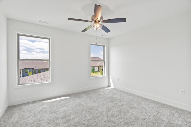 6504 Walsby Dr, Columbia, MO 65201 - carpeted spare room featuring ceiling fan, baseboards, and visible vents