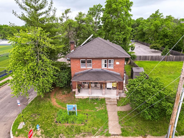901 Range Line St, Columbia, MO 65201 - view of front facade featuring brick siding, a chimney, and a patio