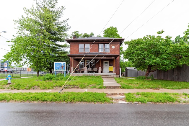 901 Range Line St, Columbia, MO 65201 - view of property featuring brick siding, a porch, and a chimney