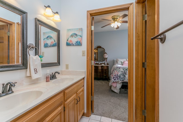 bathroom with tile patterned flooring and vanity