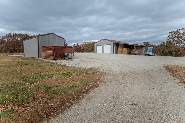 view of outbuilding with a garage