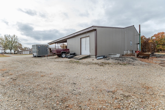 view of outdoor structure with a garage