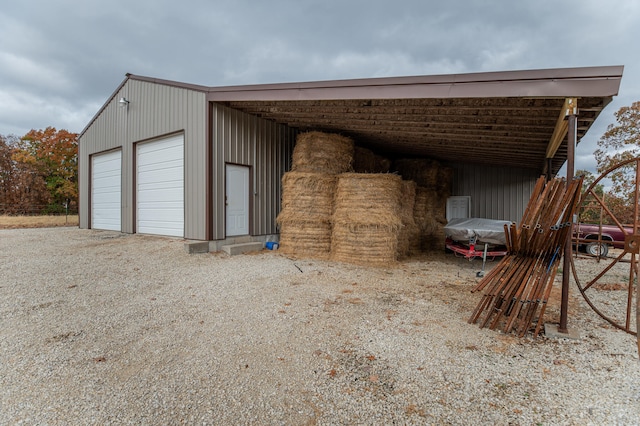 view of outbuilding featuring a garage