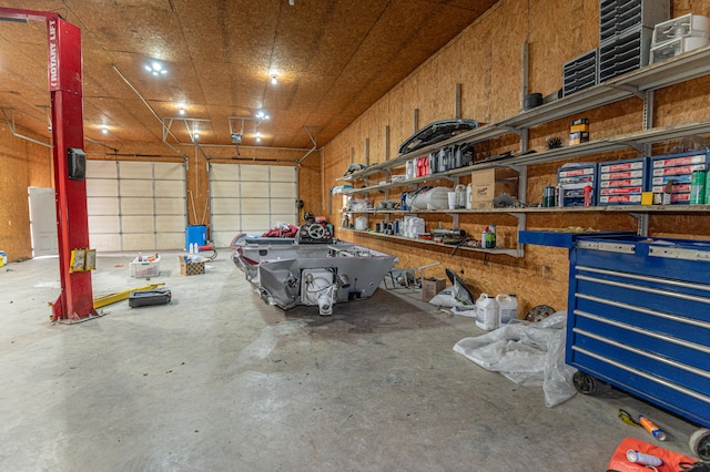 garage with wood walls