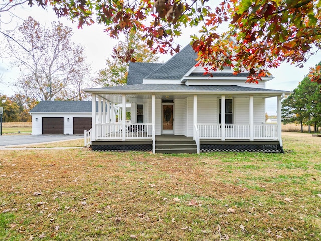 231 State Route W, Fayette, MO 65248 - farmhouse with covered porch, an outdoor structure, a front yard, a garage, and a shingled roof