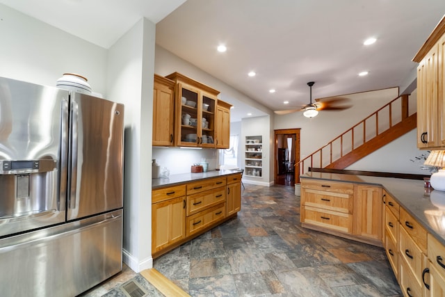 kitchen with stainless steel refrigerator with ice dispenser and ceiling fan