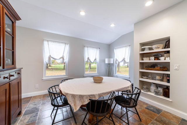 231 State Route W, Fayette, MO 65248 - dining space with vaulted ceiling, baseboards, stone tile flooring, and recessed lighting