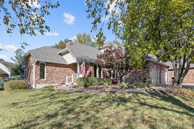 3405 Woodrail Ter, Columbia, MO 65203 - view of front facade with brick siding, a front yard, a chimney, a shingled roof, and a garage