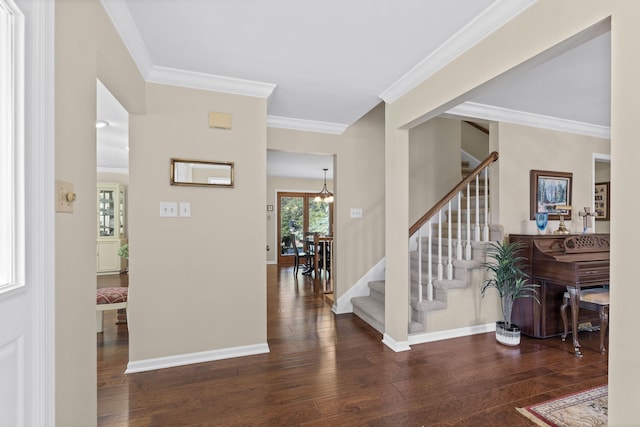 3405 Woodrail Ter, Columbia, MO 65203 - entrance foyer with ornamental molding, stairs, wood finished floors, baseboards, and a chandelier