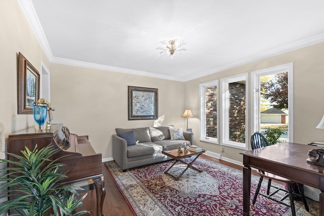 living room featuring hardwood / wood-style flooring and crown molding