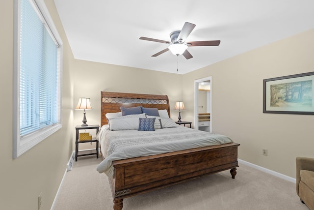 3405 Woodrail Ter, Columbia, MO 65203 - bedroom with light colored carpet, baseboards, and a ceiling fan