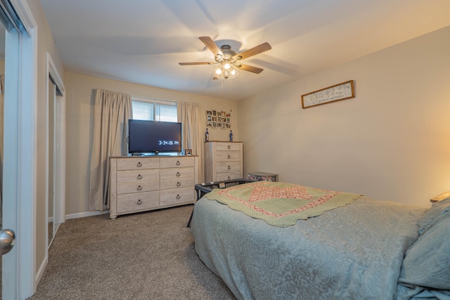 bedroom with ceiling fan and carpet flooring